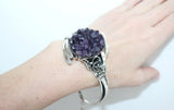 Discover the beauty and craftsmanship of Armenian jewelry with our Sterling Silver Bracelet. Adorned with a large, drusy amethyst gemstone, this artisan-designed piece exudes elegance and luxury. Made with 925 silver, the cuff style makes it easy to wear and perfect for any occasion. Elevate your style with the spirit of Armenia.