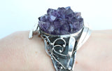 Add some "spirit" to your jewelry collection with this artisan-designed Armenian bracelet. Featuring a stunning drusy amethyst gemstone and crafted from high-quality sterling silver, this purple gemstone cuff bracelet is perfect for any women looking to make a bold and unique statement.