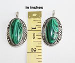 Indulge in the unique beauty of these artisan earrings made with exquisite Armenian craftsmanship. Made from sterling silver, each earring features a 925 stamp and an oval malachite gemstone. Embrace the one-of-a-kind design and quality of these handmade earrings.
