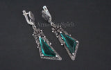 Long earrings with bows, marcasites and made of sterling silver 925. Even though they have a noticeable length, they don't feel heavy at all, which is a huge plus. For women with with sensitive skin, who often struggle with earrings causing irritation. You can wear  these earrings for hours with absolutely no discomfort - a testament to the quality of the materials used.